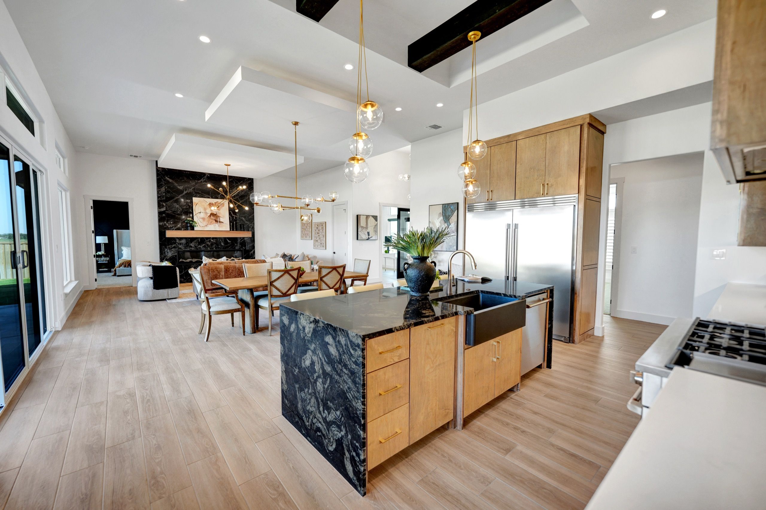 Open concept living and dining area in Midland custom home